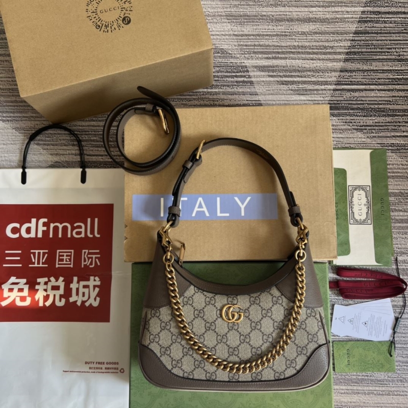 G*u*i top handle bags